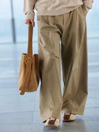 Curved Leg Pleated Trousers