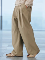 Curved Leg Pleated Trousers