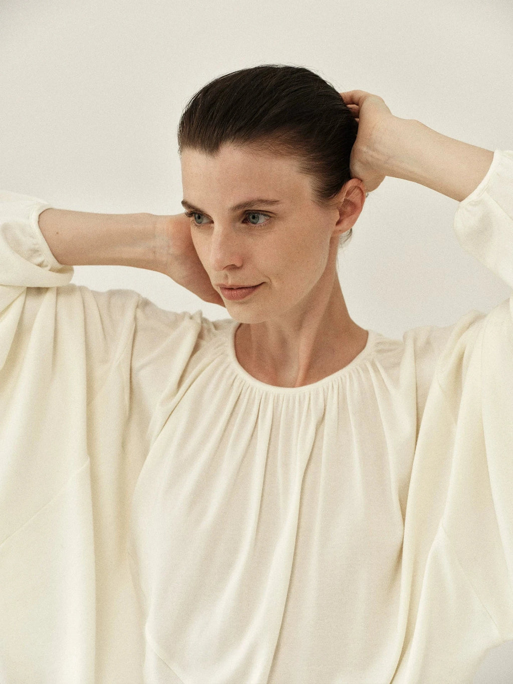 Pleated Round-Neck Draped Knit Top