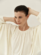 Pleated Round-Neck Draped Knit Top