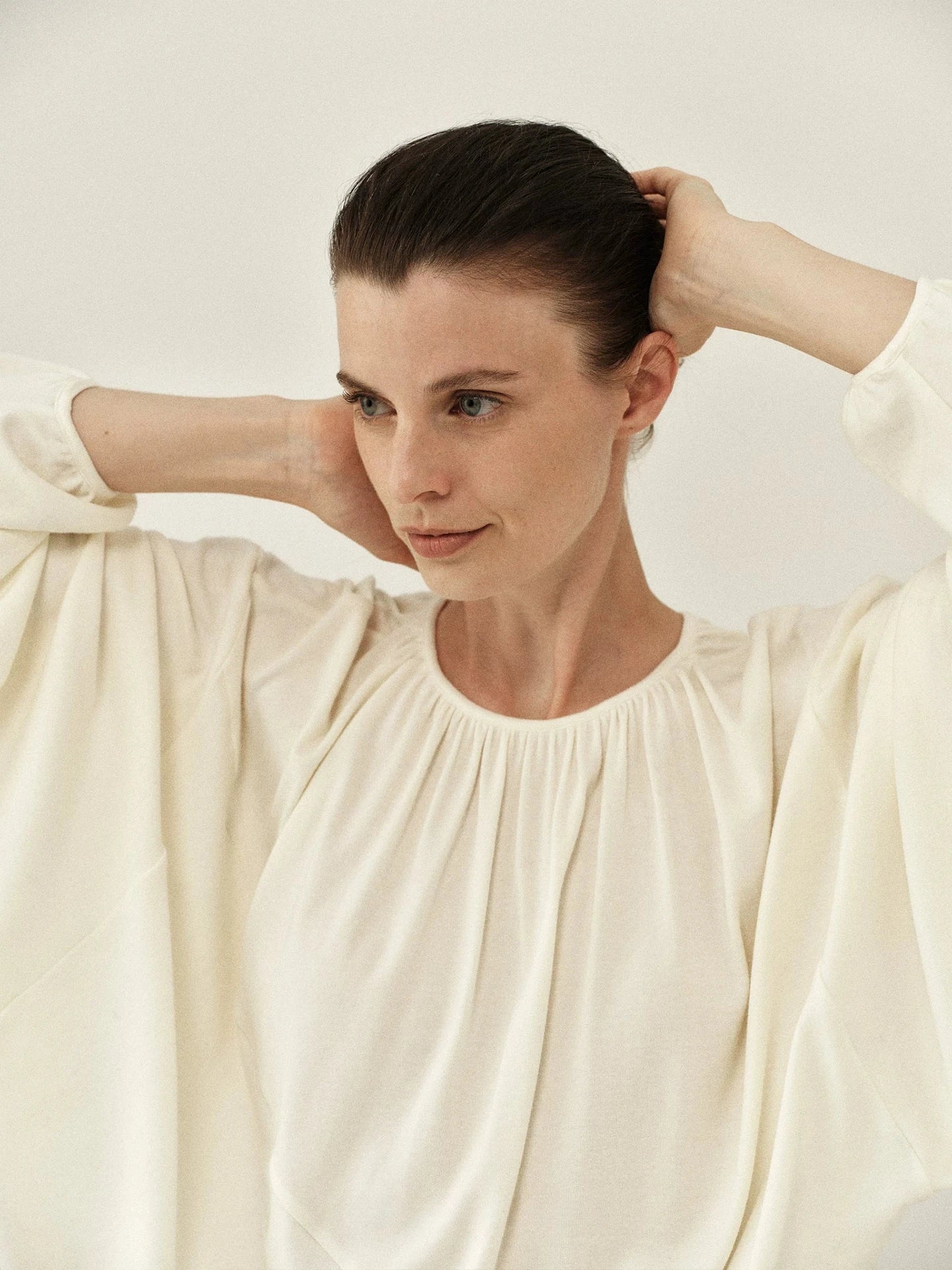Pleated Round-Neck Draped Knit Top